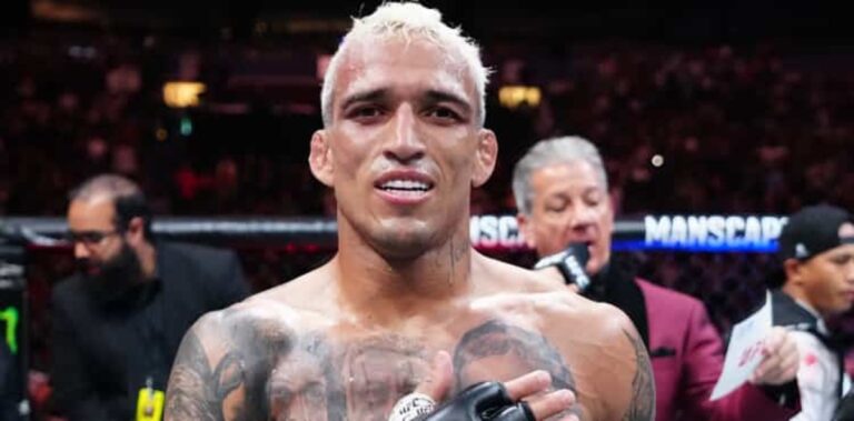 Charles Oliveira dominates Max Holloway in UFC 326