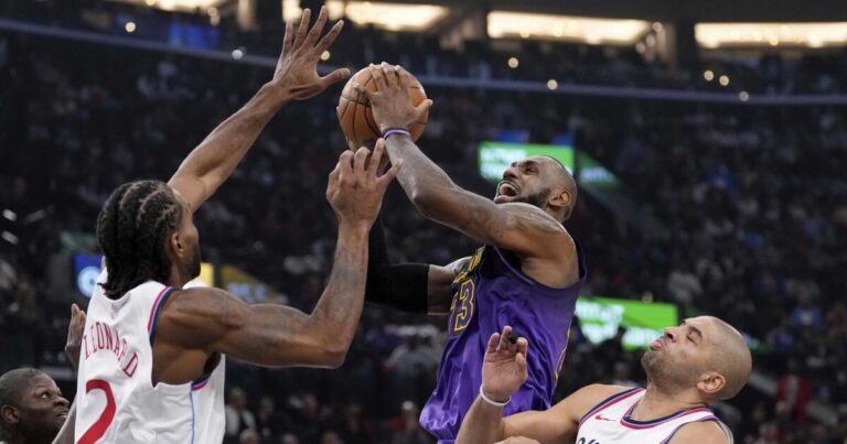 Clippers show Lakers what they aren't in first