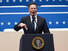 Elon Musk 'creepily' slides