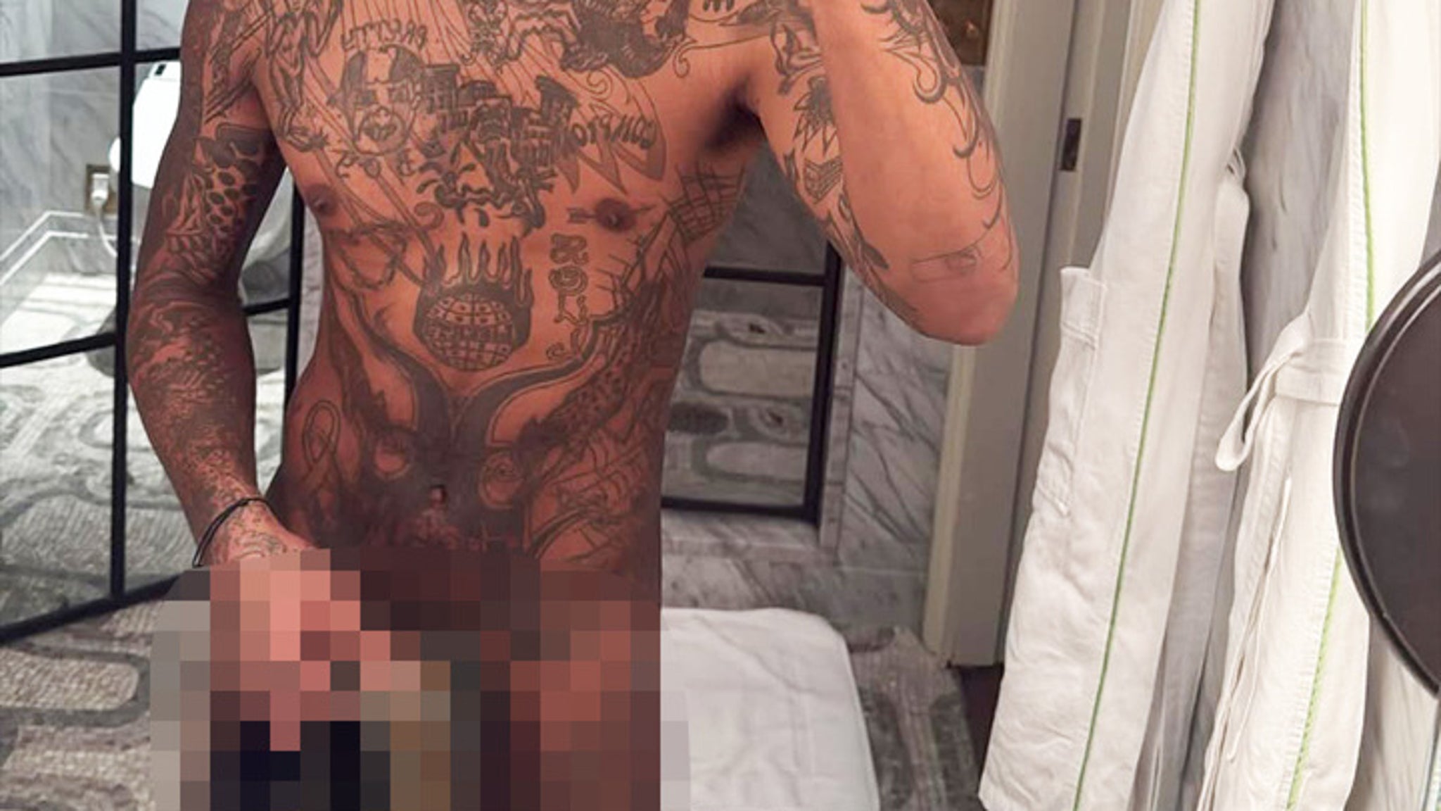 Can You Guess The unclothed Singer In This NSFW Shot?!
