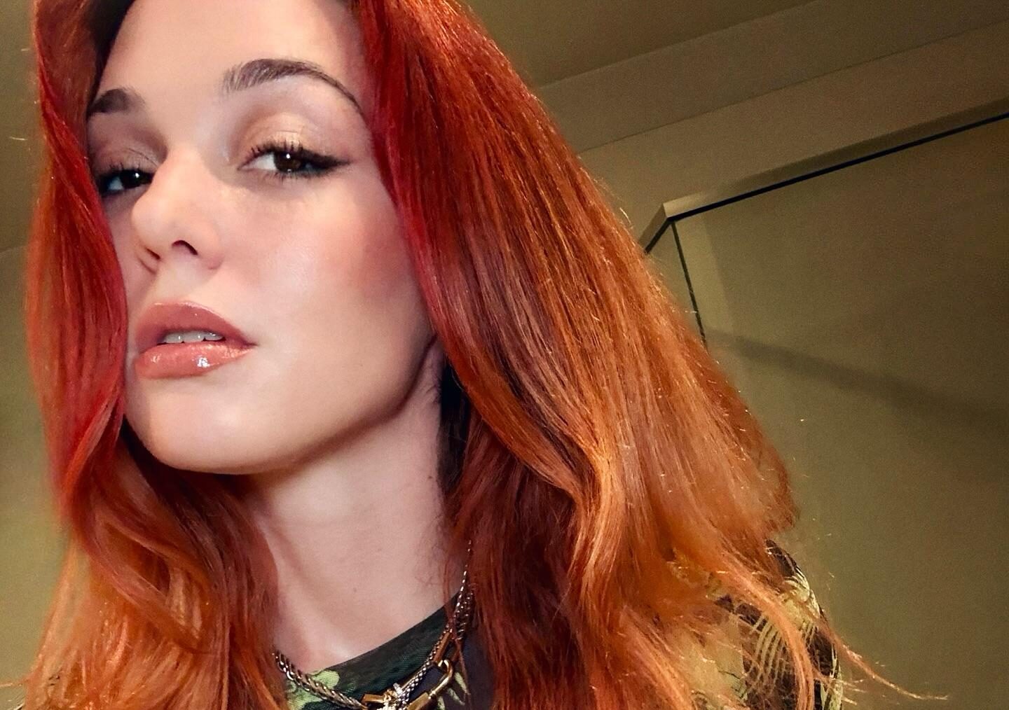 Jennifer Stone Stuns In Fiery Red Hair And Dragon | Gossip Wire News
