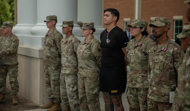Secretary of the Army Pins Medals on Troops Who