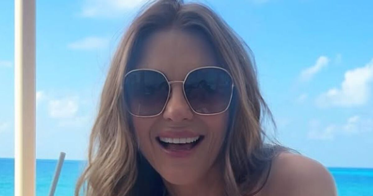 Liz Hurley goes topless on luxury island hours before | UK News