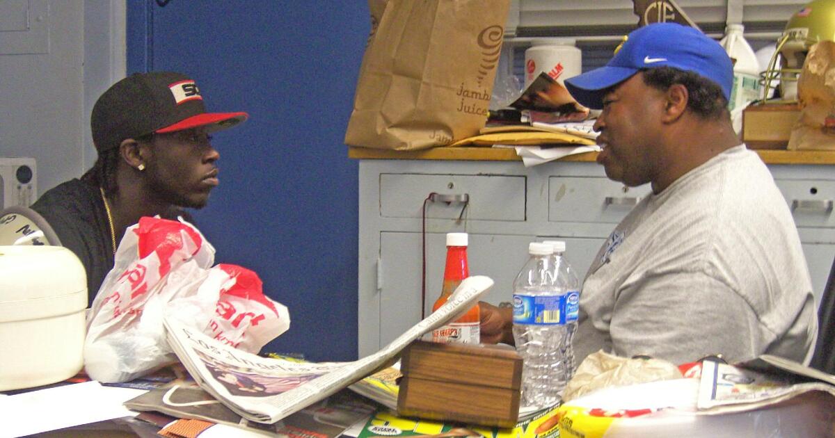 Football coach Robert Garrett continues to be