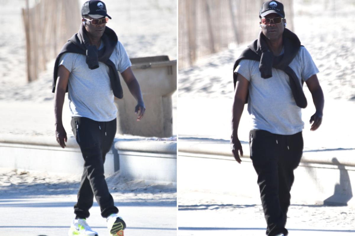 Chris Rock takes sweaty stroll on LA beach as heat