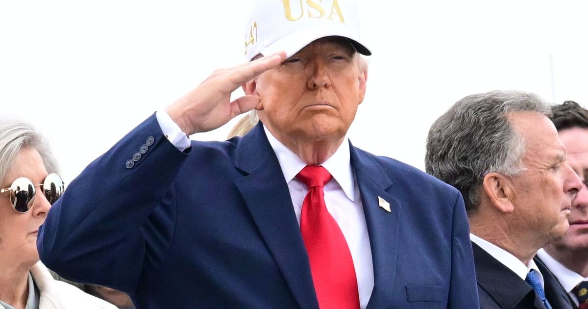 Emotional Trump salutes coffins of 6 US soldiers