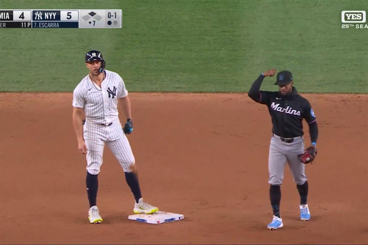 Yankees' Giancarlo Stanton swipes first base in | Sports News