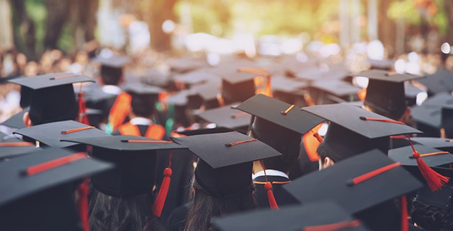 College Grad With Medical Needs Walks With Her