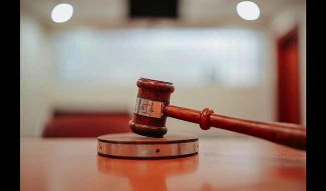 Judge Places Temp. Pause on Disbursement of DOJ