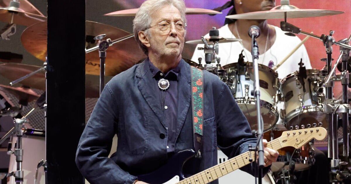 Eric Clapton walks off stage after being struck by fan | UK News