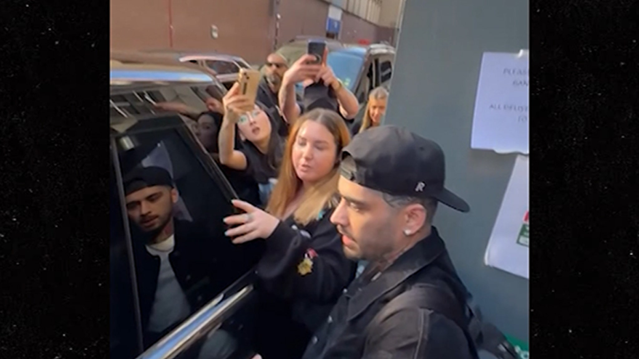 Zayn Malik Snaps At Fans As They Block Him Getting