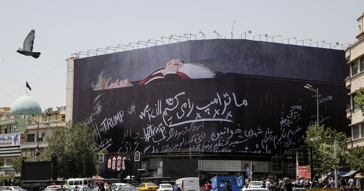 upsetting giant mural showing Trump dead in a